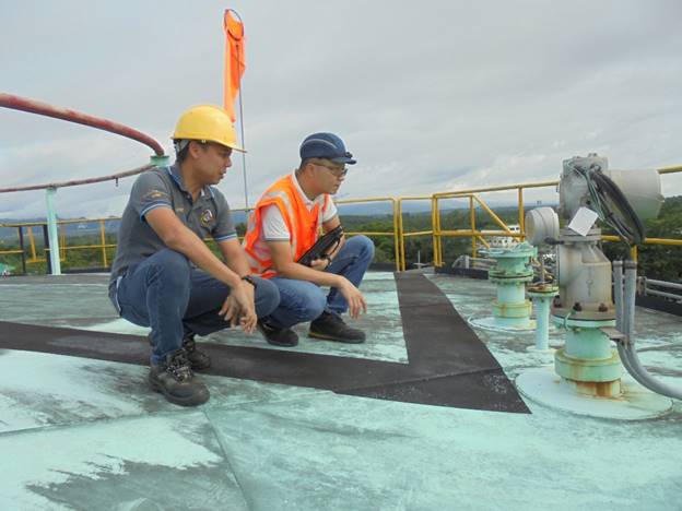 A few men sitting on a roofAI-generated content may be incorrect.