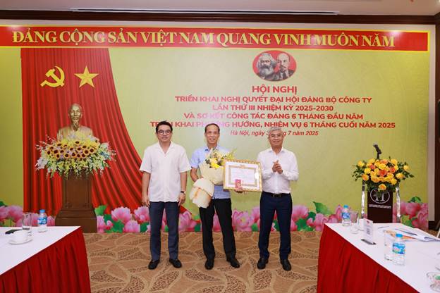 A group of men standing in front of a bannerAI-generated content may be incorrect.